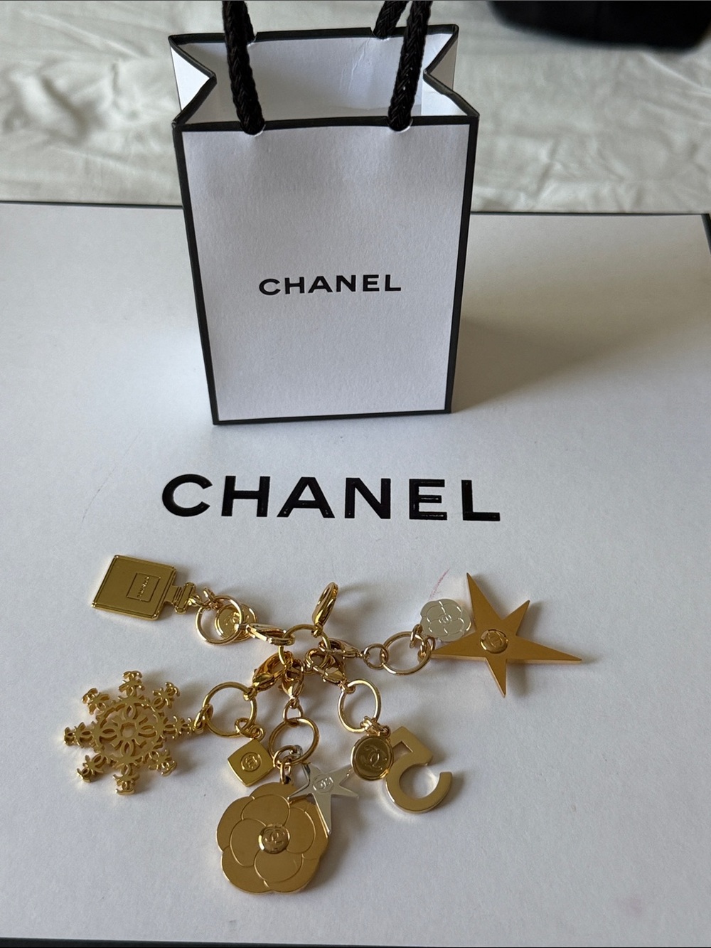 CHANEL Gold-Tone Multi Charm Keychain with Camellia & Star